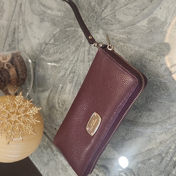Michael Kors Handbags - Michael Kors Burgundy Leather Large Zip Around Wallet Wristlet